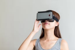 Woman using the virtual reality headset.jpeg